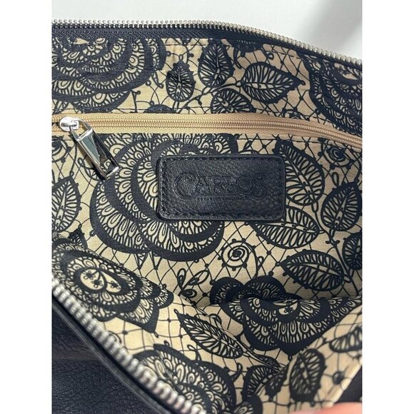 Carlos Santana Black and Silver Chain Edge Wristlet. - Picture 3 of 3